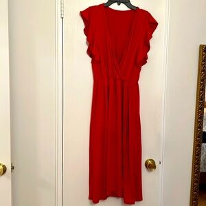 Bright red long wrap dress with flutter sleeves and elastic waist. Size L